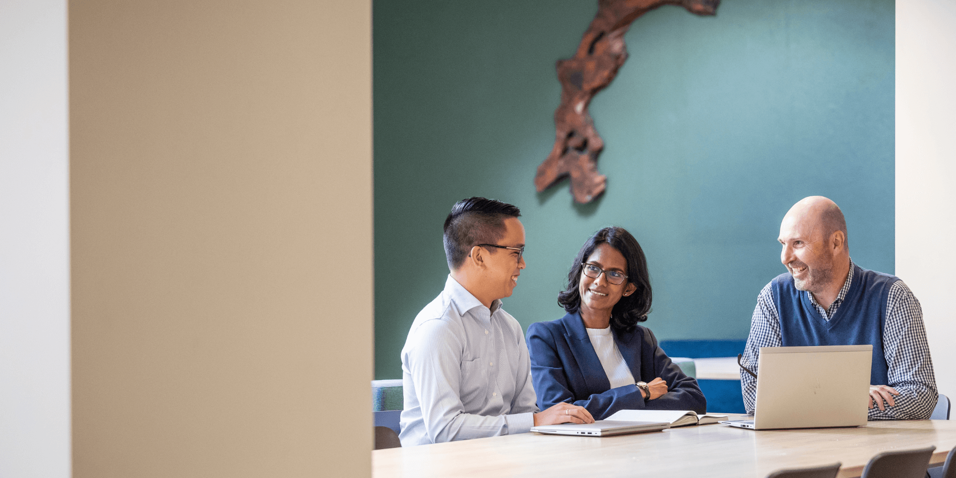 Douglas colleagues in a meeting